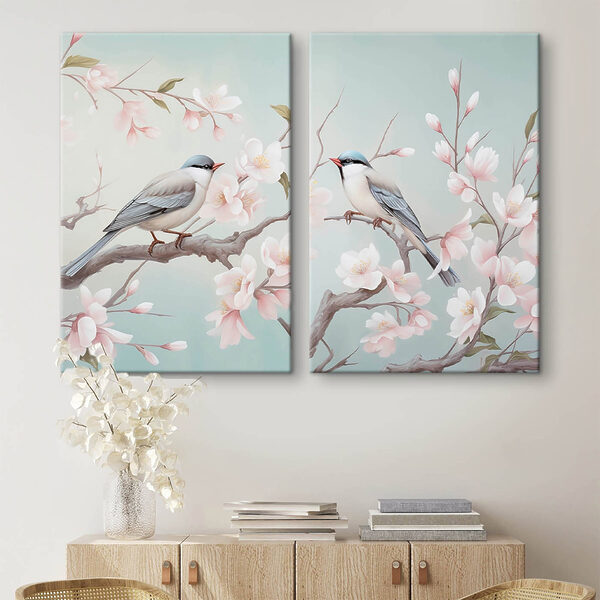 Couple of birds on a branch with flowers