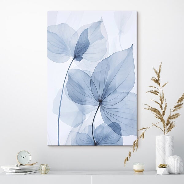 Delicate blue leaves on white backdrop