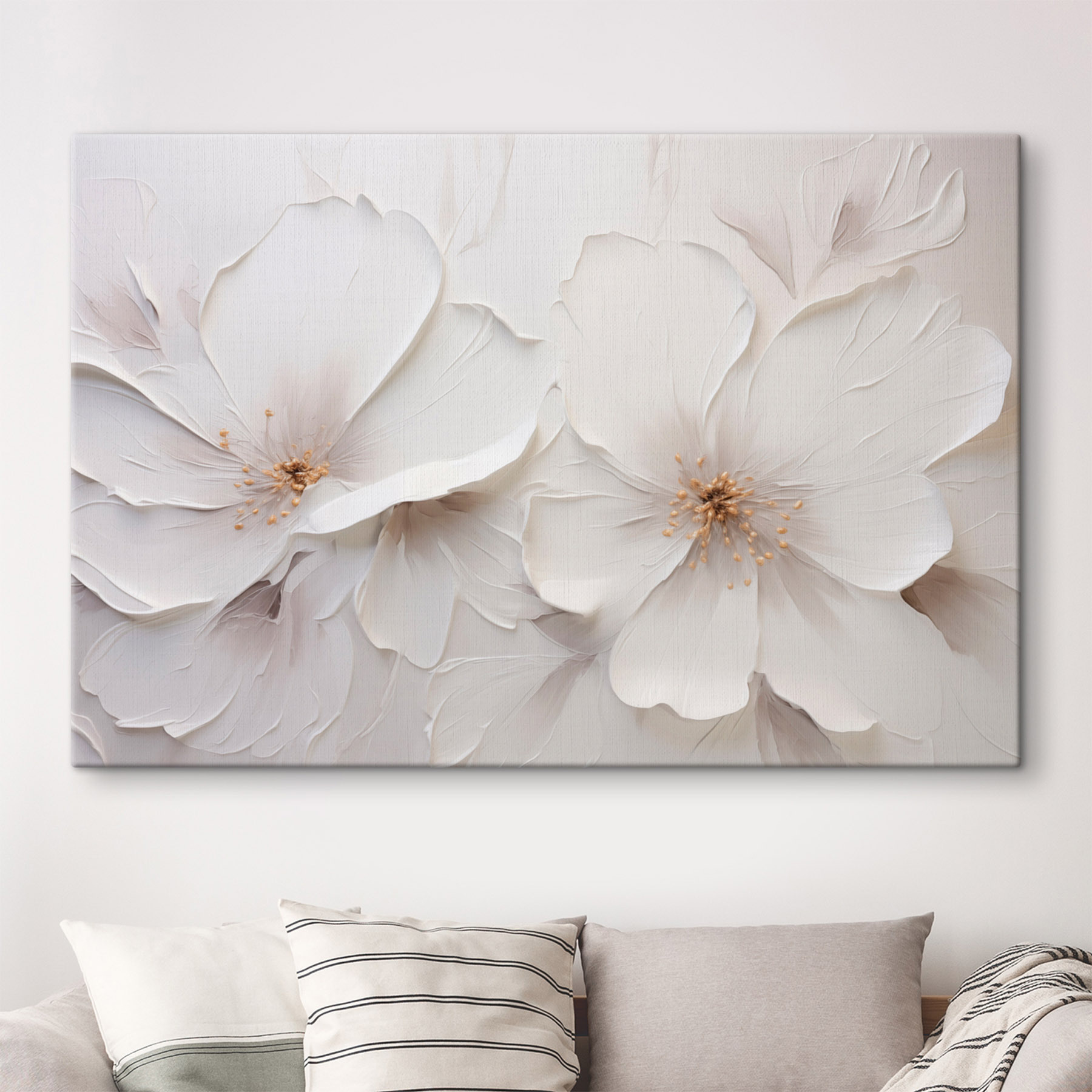 White flower art on a wall