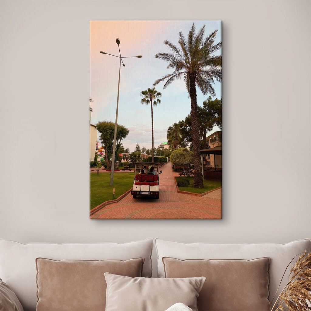 Group of people riding a golf cart