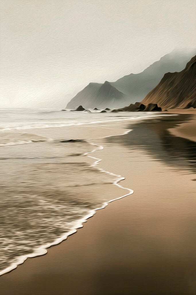 Beach with waves and mountains